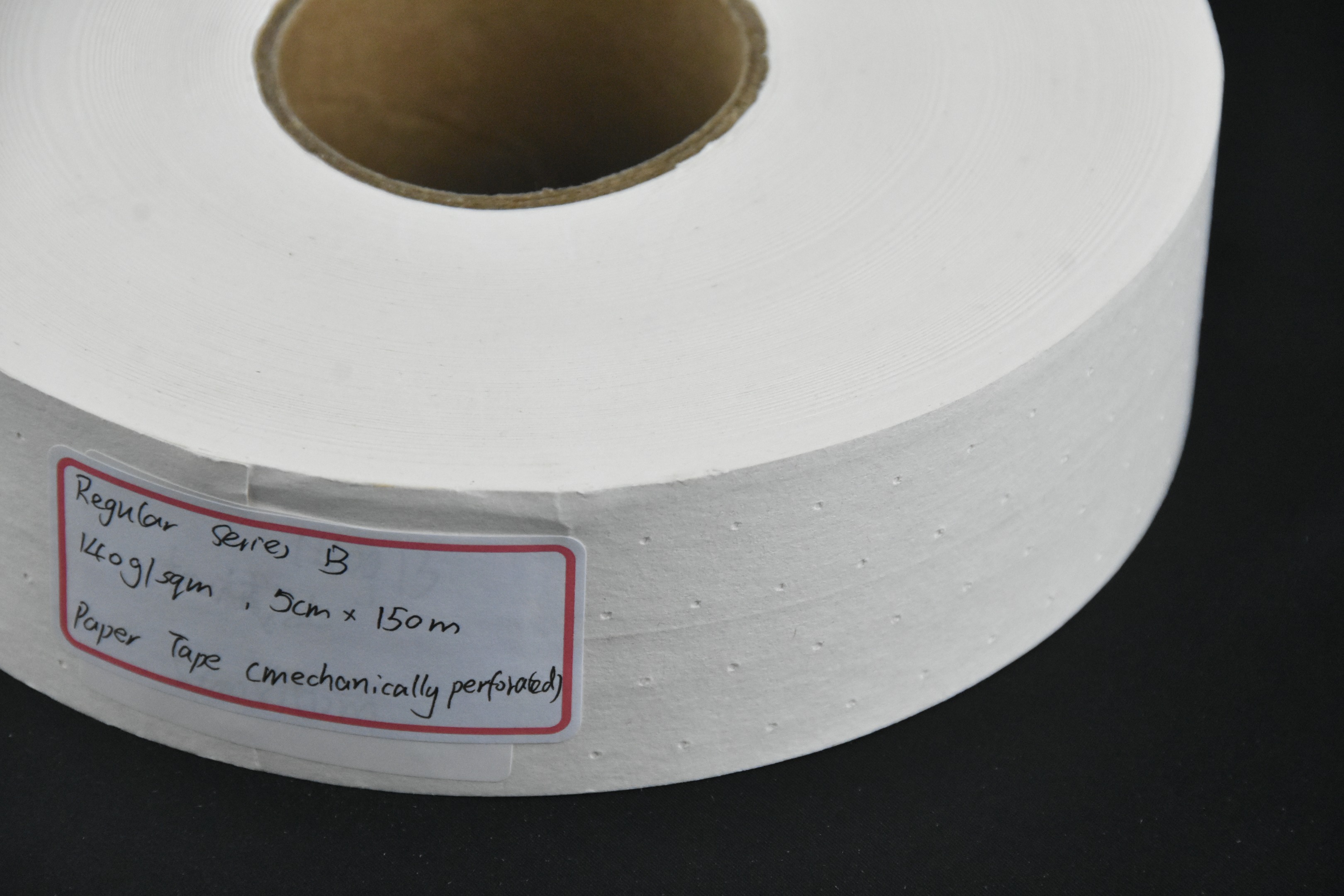 Mechanical hole drywall paper tape